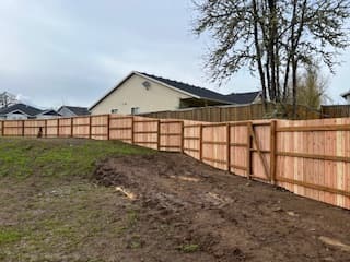 Wood fence standing strong in Oregon Coast weather